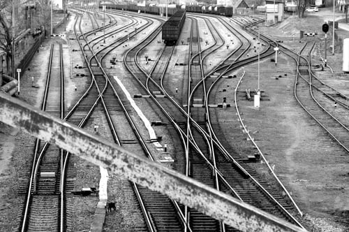 Preview: Grayscale shot of an old rail station in a small town