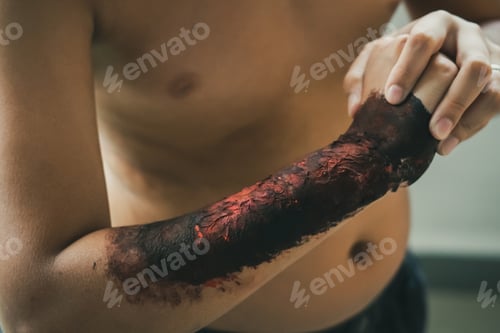 Preview: Close up of Zombie's hand with blood. Horror and scary concept. Thriller concept.