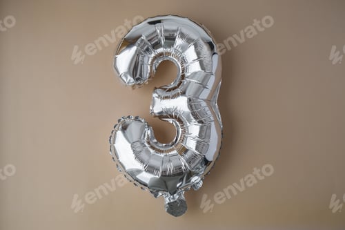 Preview: 3 three metallic balloon on beige neutral background. Greeting card silver foil balloon number Happy
