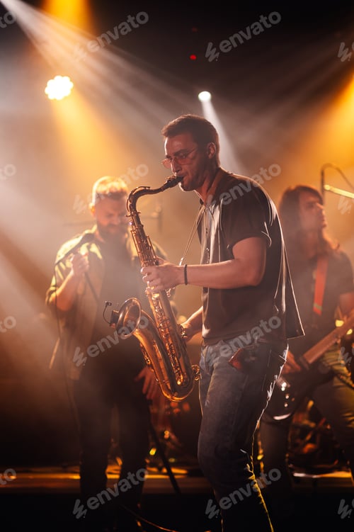 Preview: Saxophonist performing live with band on stage