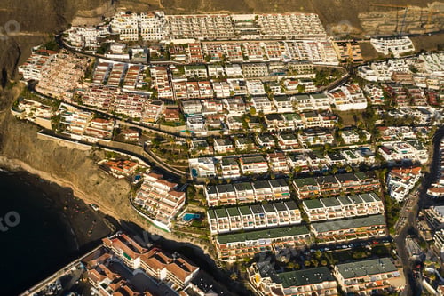 Preview: Top view of the houses located on the rock of Los Gigantes at sunset, Tenerife, Canary Islands