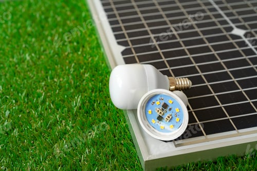 Preview: Solar energy panel and light bulb, green energy
