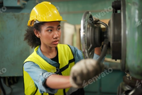 Preview: Factory Engineer Operating machines in industry factory.