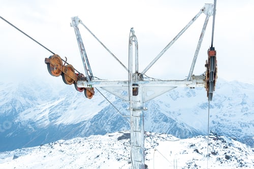 Preview: Close-up of the cable car on the background of snowy mountains. Ski resort.