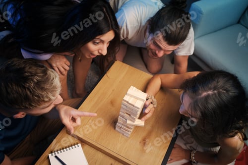 Preview: Group of friends playing Jenga together