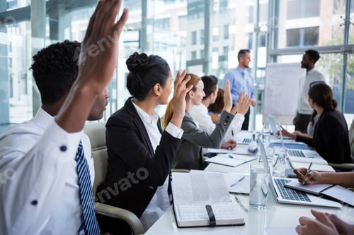 Preview: Colleagues raising their hands during meeting