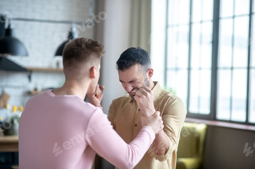 Preview: Two young men fighting and looking agressive