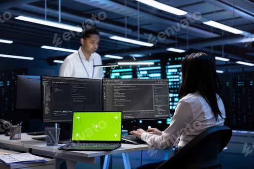 Preview: Mockup notebook and server racks rows controlling network resources