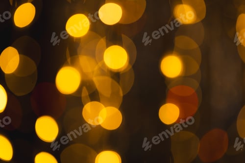 Preview: Yellow bokeh lights with copy space on dark background