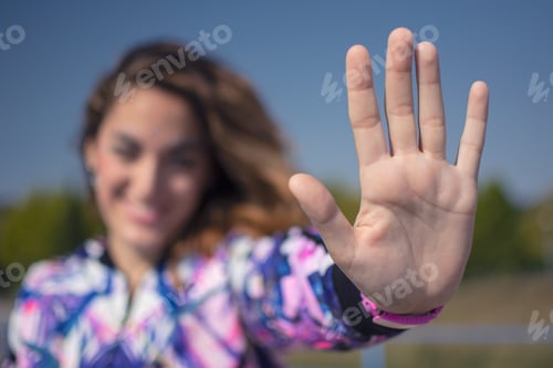 Preview: Beautiful girl saying stop with her hand