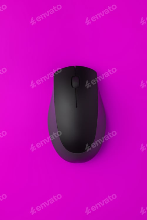Preview: top view of the simple computer mouse on the color background with copy space, minimalist concepts