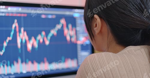 Preview: Woman study the stock market data