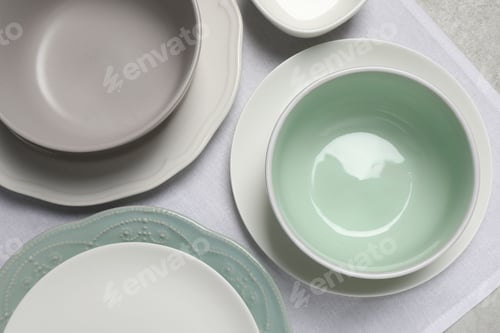 Preview: Beautiful ceramic dishware on table, top view