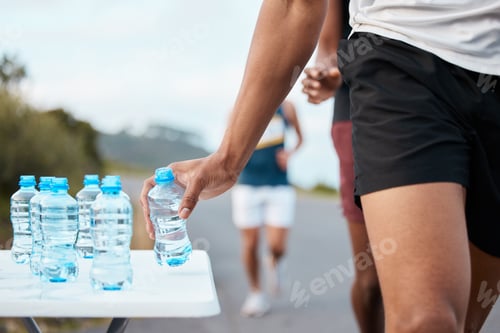 Preview: Hand, water and a marathon runner in a fitness competition or race closeup for cardio on a street.