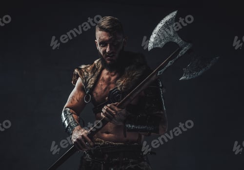 Preview: Evil legendary viking holding two handed axe in dark background