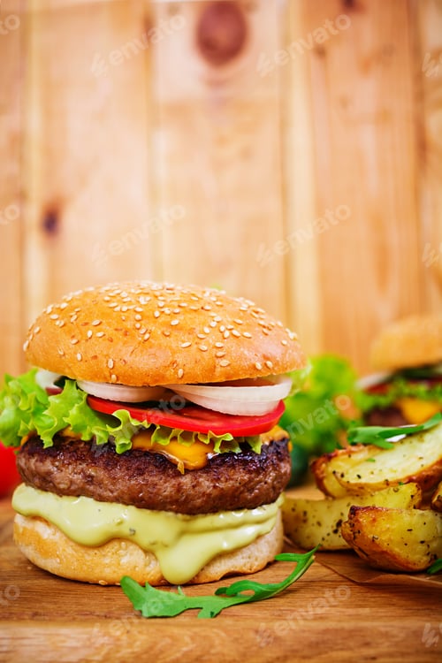 Preview: Delicious handmade burger on wooden background. Close view