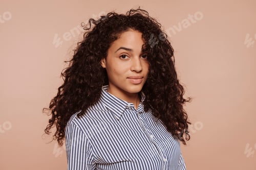 Preview: Young beautiful multiracial woman with curly hair