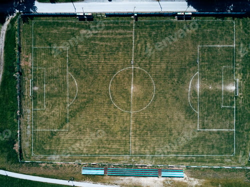 Preview: Aerial view of real soccer pitch, football field drone pov