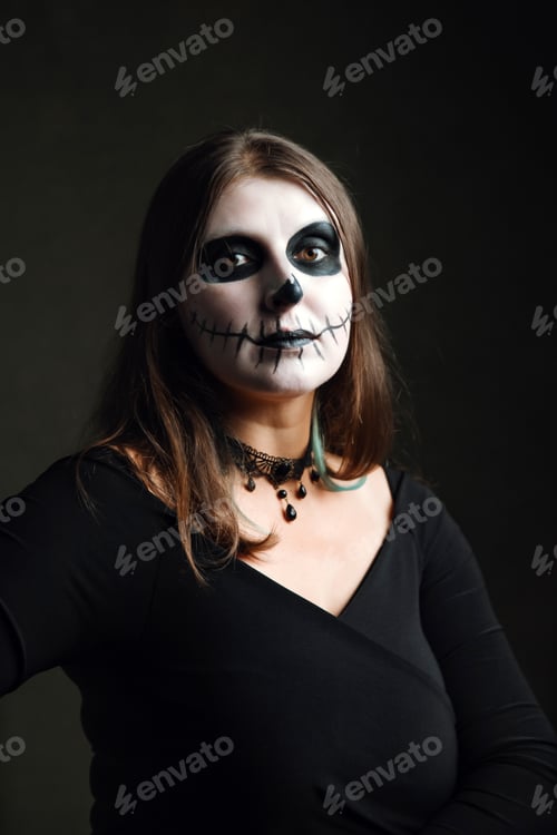 Preview: Woman with sugar skull makeup . Portrait of Calavera Catrina