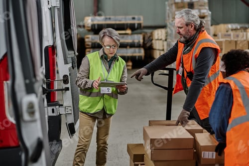 Preview: Manager examining delivery routes on tablet pc