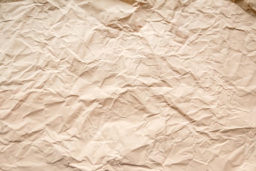 Visualização: Papel amassado cor de pêssego para fundo.