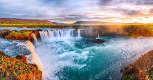 Preview: Fantastic sunrise scene of powerful Godafoss waterfall.