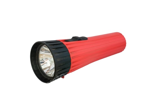 Preview: Red flashlight off laying on white background