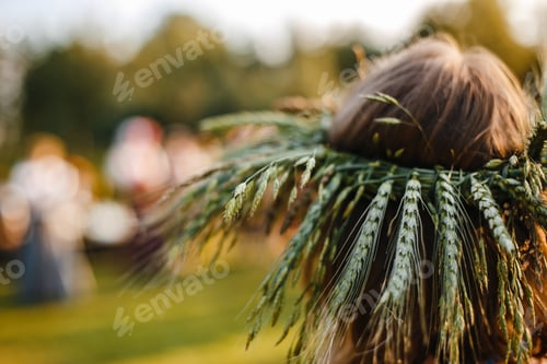 Preview: Soft focus of a traditional headpiece on a woman's head