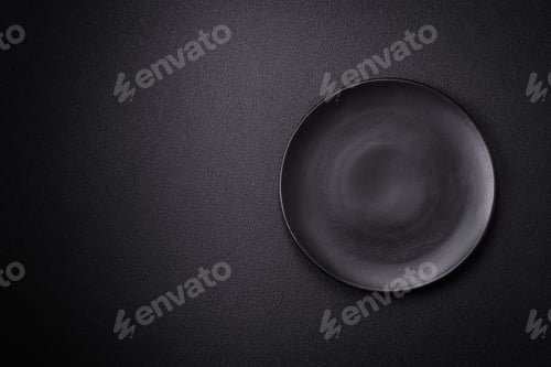 Preview: Bumpy empty ceramic plate on a textured concrete background
