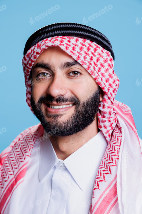 Preview: Muslim man in traditional headscarf