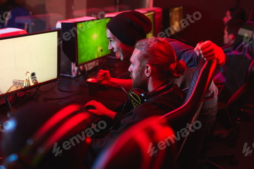 Preview: Excited guys playing computer game