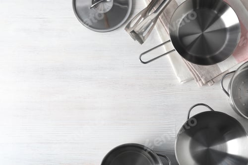 Preview: Kitchen utensil on white wooden background, top view