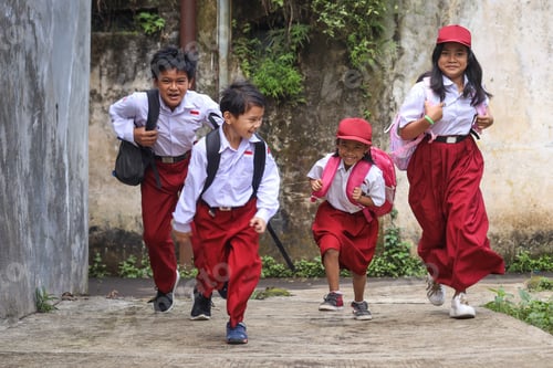 Preview: Excited Indonesian primary school kids running cheerful