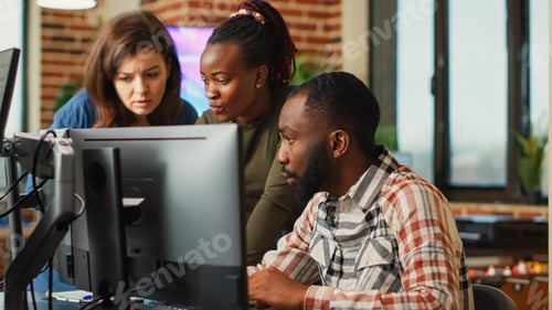 Preview: Group of software developers using creative skills to plan new advanced interface