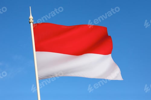 Preview: Bright Red and White Flag against a Blue Sky