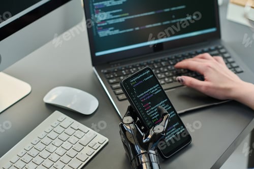 Preview: Developer typing codes on devices