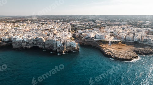 Preview: Aerial view of coastal Polignano a Mare cityscape with white buildings in Italy