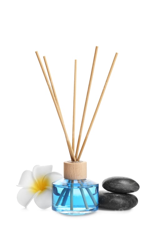 Preview: Reed air freshener, flower and spa stones on white background