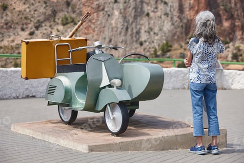 Preview: Picturesque sidecar sculpture with tourist in Ayna village. Castilla LaMancha