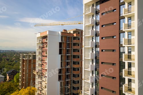 Preview: Aerial view of multi storey residential apartment buildings under construction. Real estate