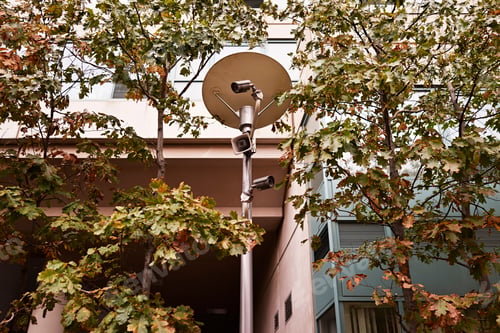 Preview: Low angle view of surveillance cameras on street light, Brooklyn, New York, USA