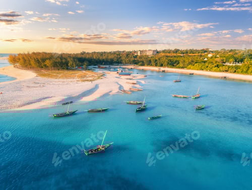 Preview: Aerial view of the fishing boats on sea coast with sandy beach