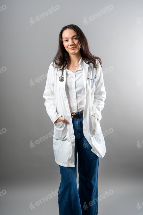 Preview: Woman in Lab Coat Smiling at the Camera