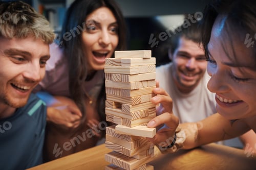 Preview: Young people playing Jenga together
