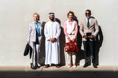 Preview: Group of multiethnic business people meeting an emirati businessman