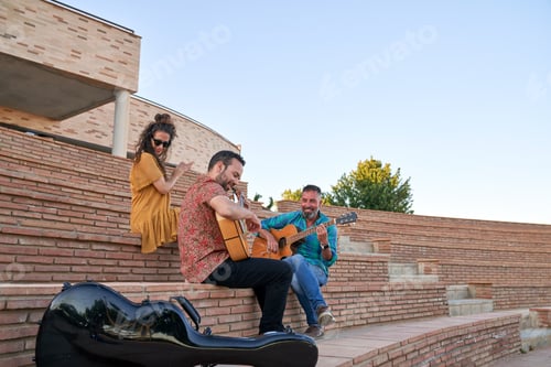 Preview: Musical trio performing flamenco guitars and a singer clapping hands
