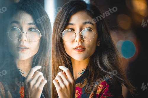 Preview: Pretty asian woman portrait with led lights