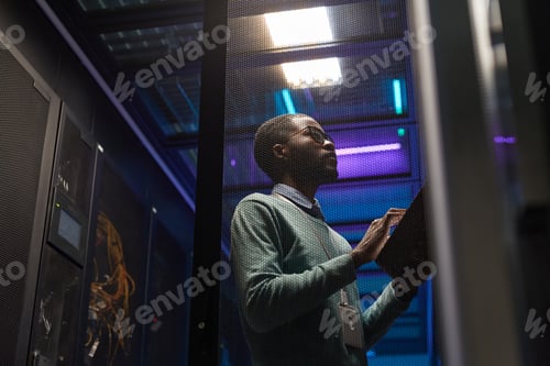 Preview: African American Network Engineer in Server Room