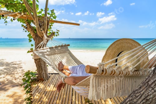 Preview: Woman relaxing at the beach