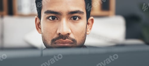 Preview: Face, focus and a business man at work on a computer in his office closeup for the company mission.